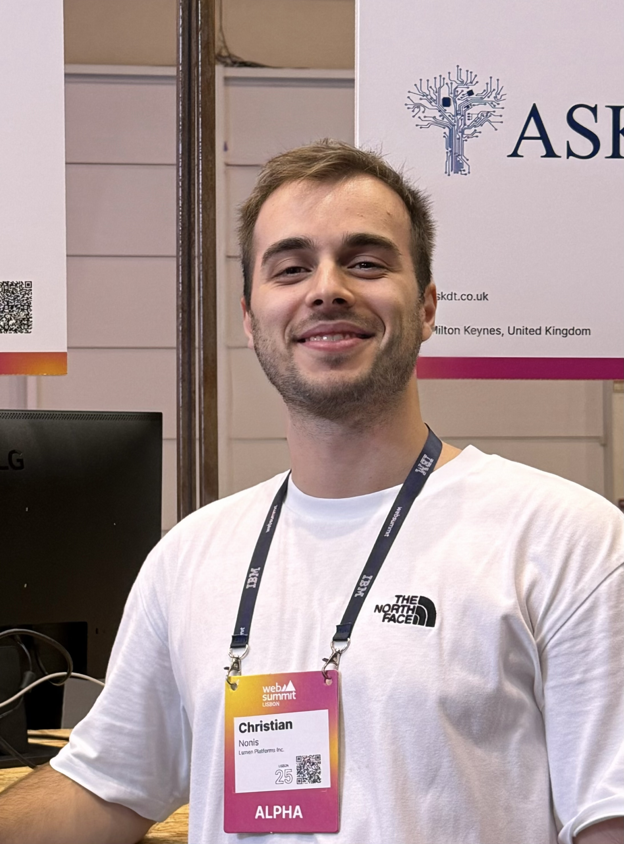 Christian at Web Summit wearing an event badge